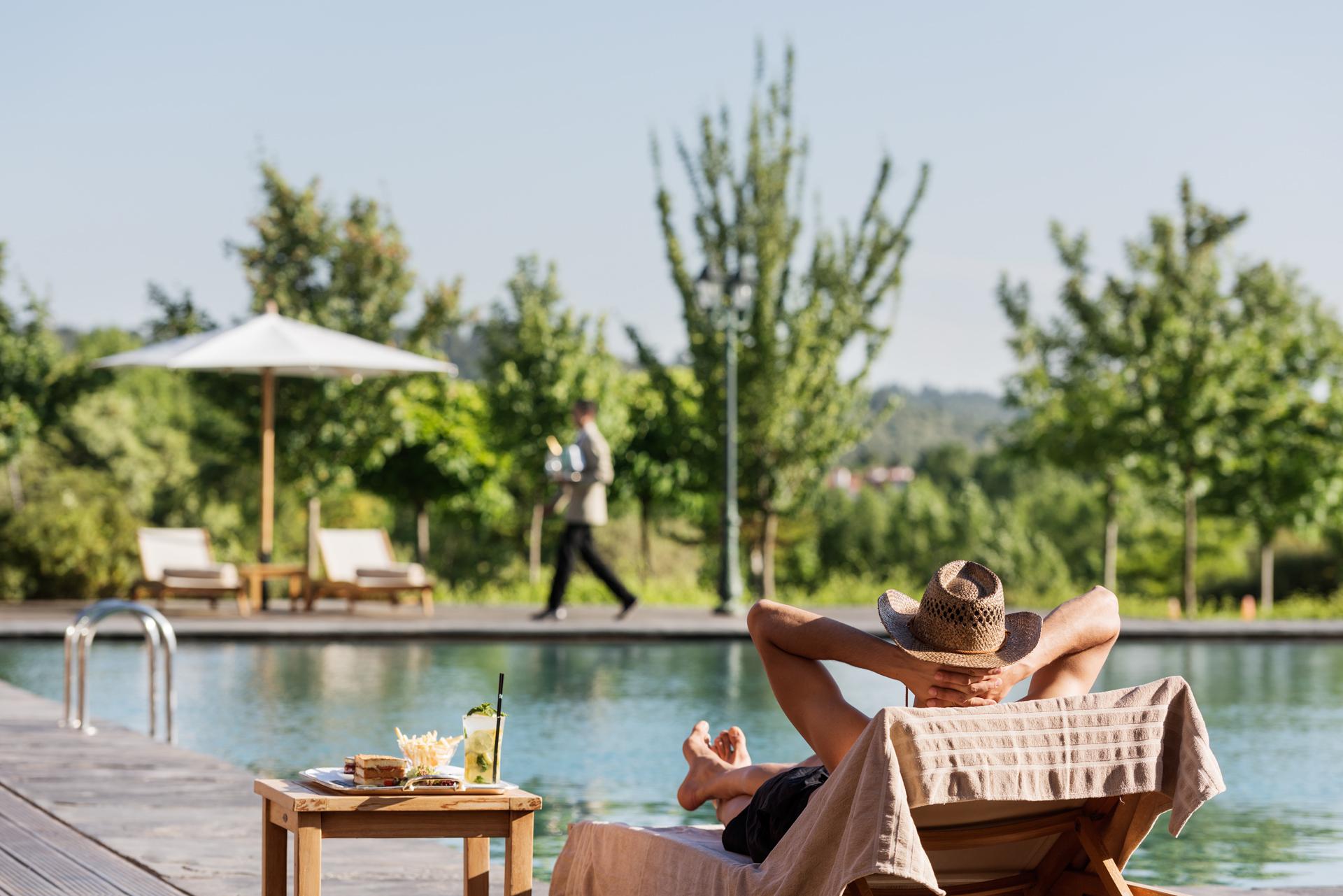 Michlifen Resort & Golf Ifrane  Exterior photo A man relaxing by a pool